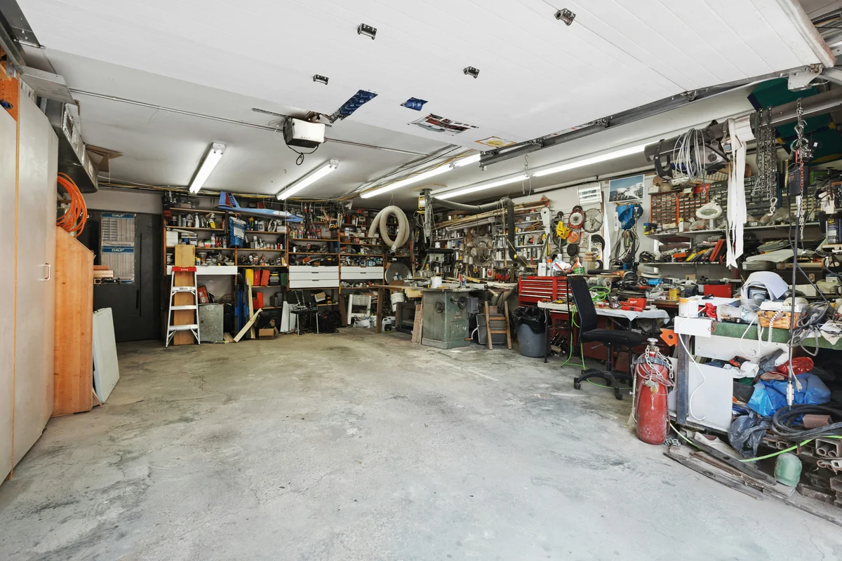 Residential garage interior with door open