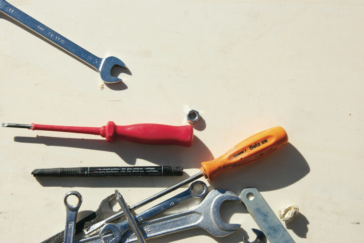 Garage door track and roller hardware