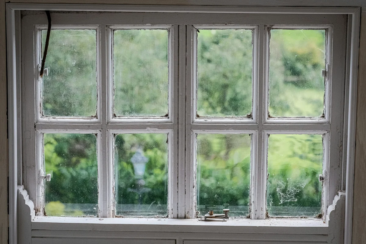 Vinyl frame window installed in residential wall